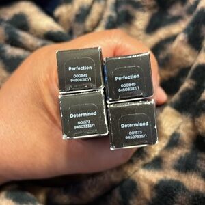 4 tubes total 
2 - PERFECTION and 2 DETERMINED
4 total  
Powerlips Fluid